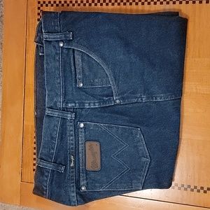 Wrangler men's denim pants, 47MWZPW, 34x34. Good condition with some fading.